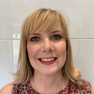 Client taking an after picture of their flawless makeup, expertly applied by KT Beauty for a stunning, long-lasting finish.